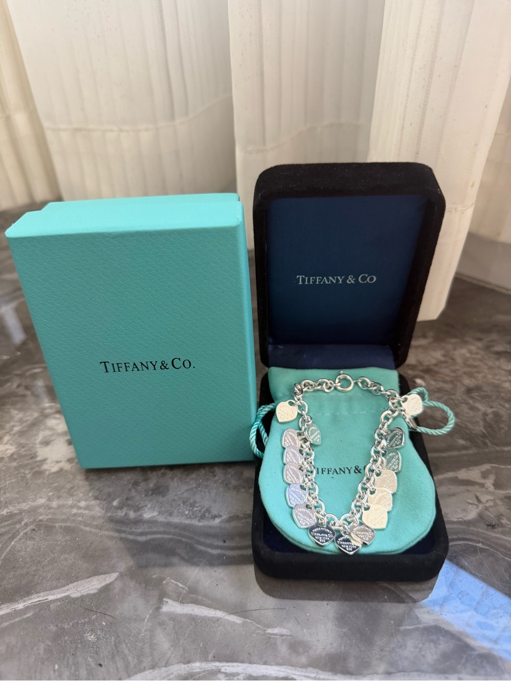 Tiffany & Co. Sterling Silver Multi-Heart Charm Bracelet with Signature Blue